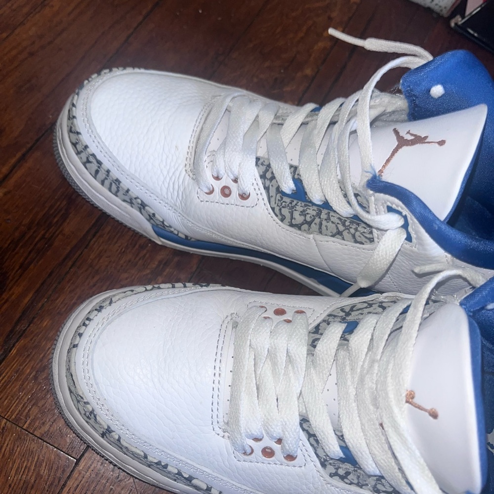 White and Blue Sneakers with Patterned Accents